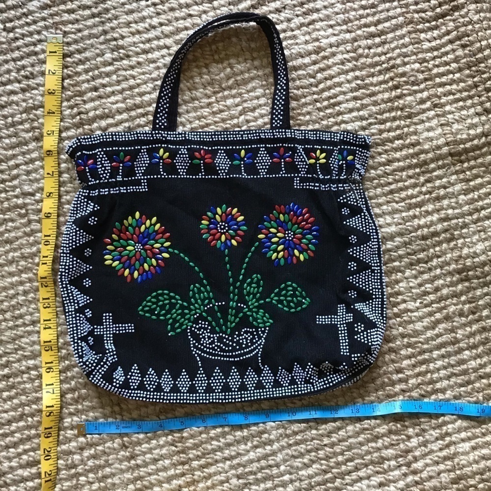 Black beaded unique handbag.